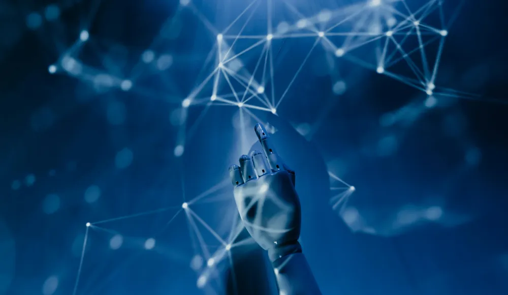 Robot pointing on ways AI benefits small businesses (& how you can implement it now)